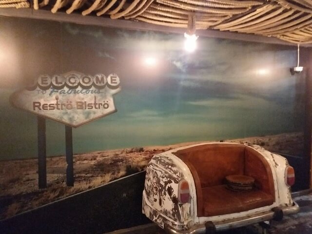 Ambassador sofa made by kernig krafts for Restro Bistro restaurant in Vadodara - shishir agrawal, partner kernig krafts