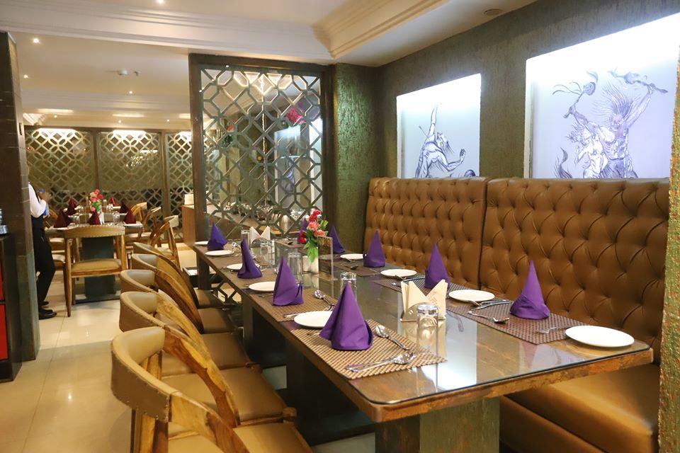 In a cozy nook, a plush sofa and chair unveil a design that exudes sophistication while ensuring relaxation by Kernig Kraft.