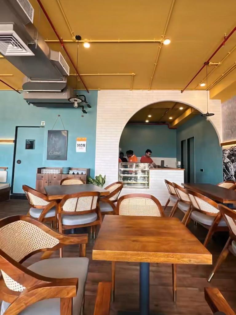 Step into our café and discover the allure of acacia wood furniture. With its captivating grain and plush upholstery, our pieces create an aesthetic haven that resonates with patrons of all ages.