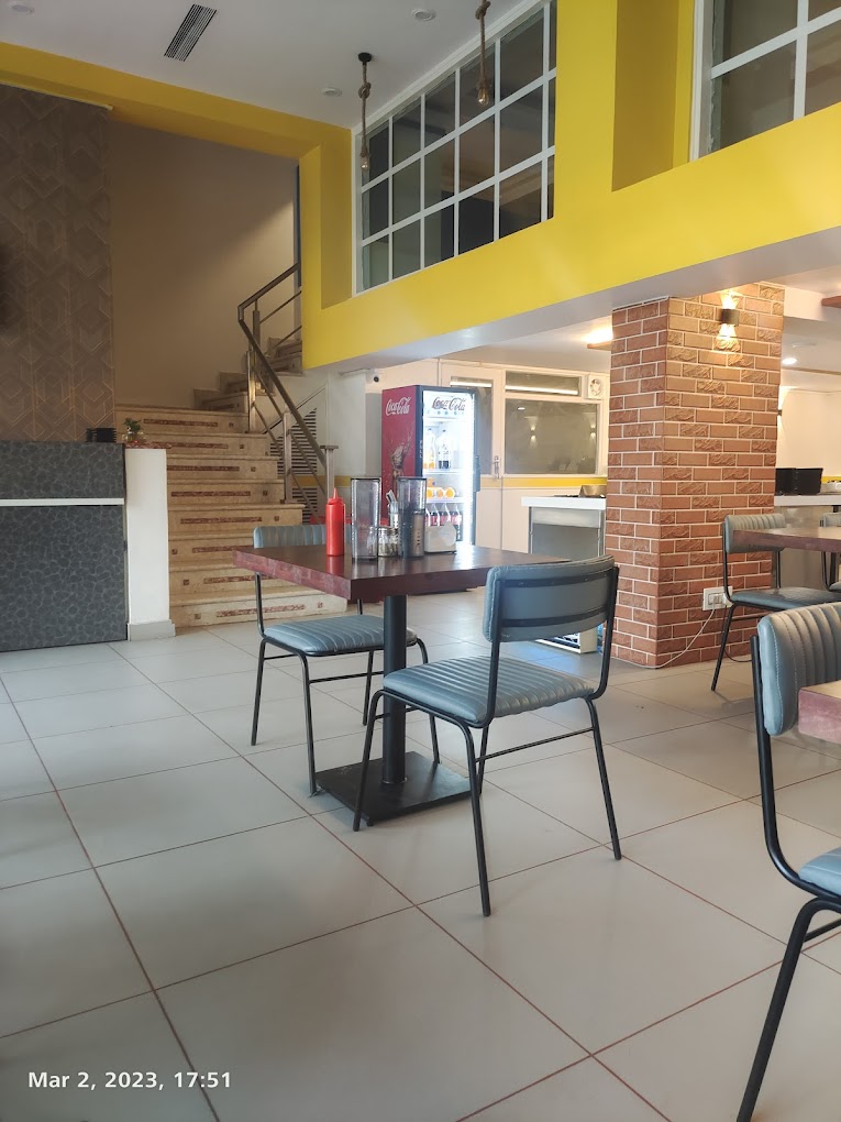 Discover the allure of meticulously crafted metal furniture with upholstery work at Kernig Kraft, where small-scale masterpieces seamlessly blend durability and comfort, elevating your space with a touch of elegance and artistry at William John's Pizza, Jodhpur