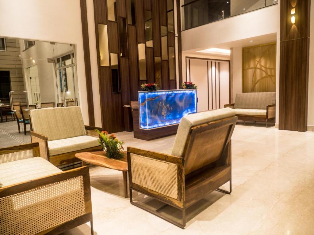 Wooden  & Metal furniture with upholstery, rope work and a marble tile top, complemented by caning work, adds a distinctive aesthetic to a restaurant's ambiance.