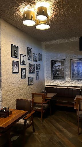 Interior of ROAD HOUSEE BWEZ Mumbai styled with Jodhpur furniture from Kernig Krafts – a perfect example of how to buy furniture in Jodhpur.