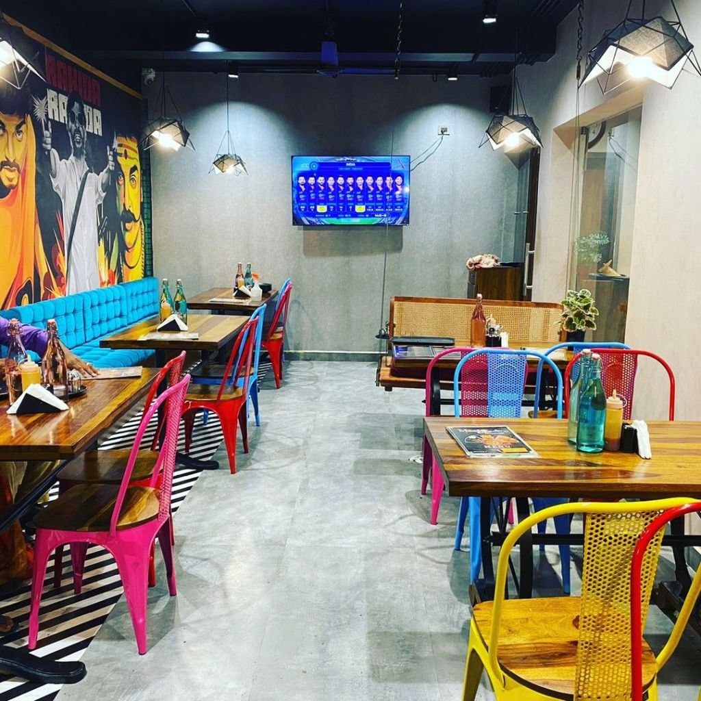 Interior of ROAD HOUSEE BWEZ Mumbai styled with Jodhpur furniture from Kernig Krafts – a perfect example of how to buy furniture in Jodhpur.