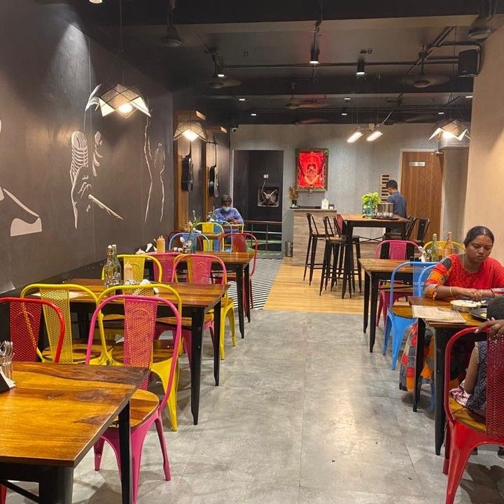 Interior of ROAD HOUSEE BWEZ Mumbai styled with Jodhpur furniture from Kernig Krafts – a perfect example of how to buy furniture in Jodhpur.