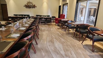 Durable soliwood chairs and table commercial hotel furniture manufactured for Ishwar Nain Hotel and Resort Deogarh Rajasthan by kernig krafts jodhpur